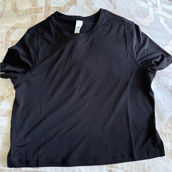 lululemon athletica Tops - lululemon athletica Ultralight Waist-Length Black Short Sleeve Tee